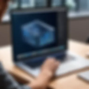 User working on a MacBook with architectural CAD designs